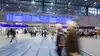 Hall of Vienna Central Station with people