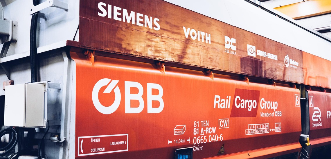 Rail Cargo Group freight wagon with Digital Automatic Coupling (DAC) technology and partner branding