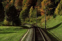 Railway track through an autumn landscape