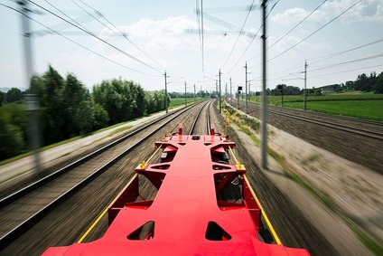 TransANT freight wagon in motion on open track.