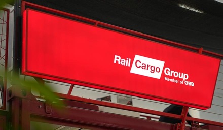 Illuminated Rail Cargo Group logo at the exhibition stand at Logitrans Istanbul