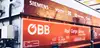 Güterwagen der Rail Cargo Group mit Digitaler Automatischer Kupplung (DAK) und Partner-Branding