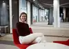 Portrait of Valerie Baumgartner in an office building, responsible for coordinating DAK testing activities.