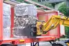 Loading of compressed waste bales into a freight wagon