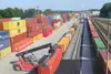 Rail Cargo Terminal Mělník with container handling vehicle and stacked containers