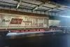 Rail Cargo Austria Güterwagen in einer Logistikhalle auf einer Bahnverladeanlage