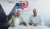 Clemens Först (RCG) und Bart Meijnen (PCT) unterzeichnen Dokumente bei einem Treffen in Wien