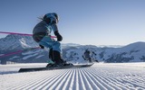 Skifahrer auf Piste in Mühlbach