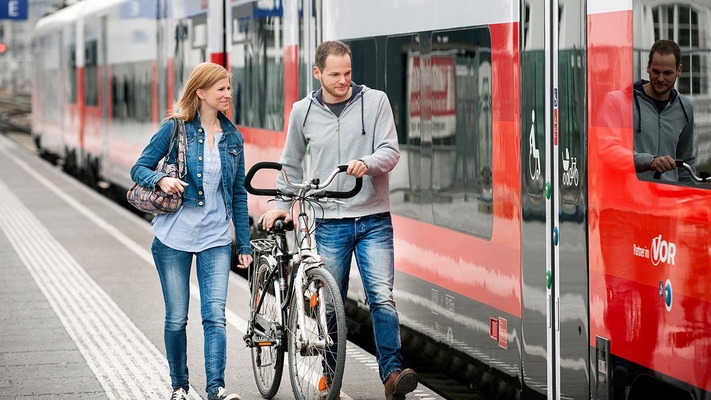 Couple on the platform with bicycles